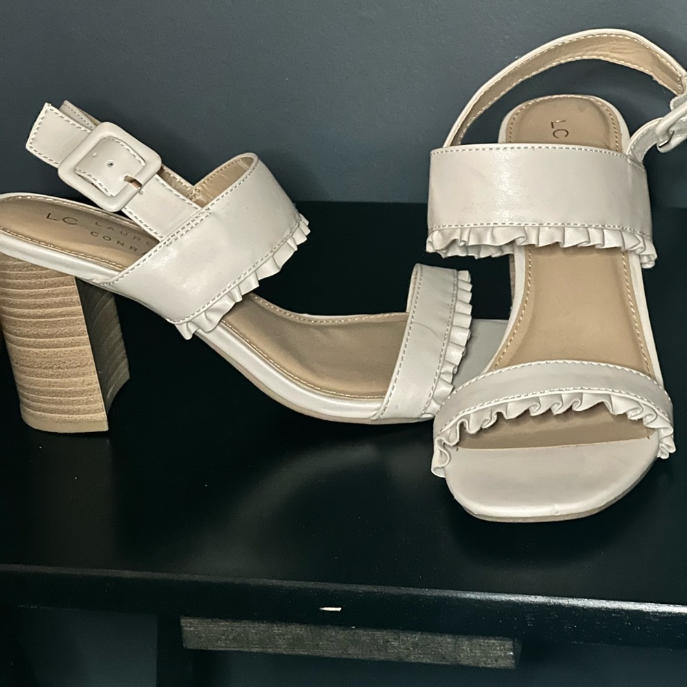 Cream ruffled open toe 4 inch heels. Only worn 1 time